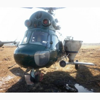 Авиауслуги вертолета - авиавнесение аммиачной селитры
