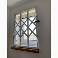 Решетки раздвижные металлические на окна, двeри, витрины Производство и установка