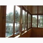 Монтаж деревянных окон и балконов