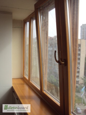 Фото 2. Монтаж деревянных окон и балконов