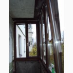 Монтаж деревянных окон и балконов