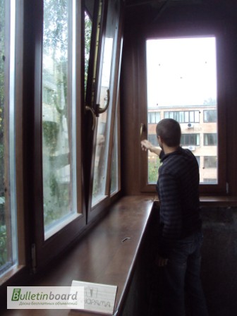 Фото 9. Монтаж деревянных окон и балконов