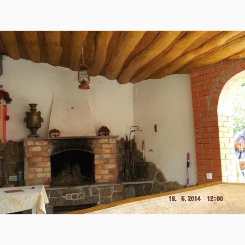 Фото 11. Небольшой дом с камином на террасе в Миргороде