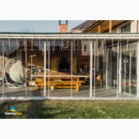 Безрамне розсувне скління PanoramGlass для альтанок і балконів