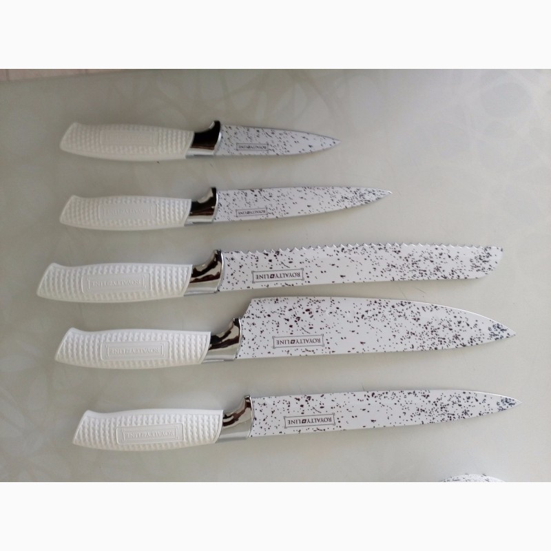 Фото 4. Метало-керамічні ножі, підставка плюс 5 ножів